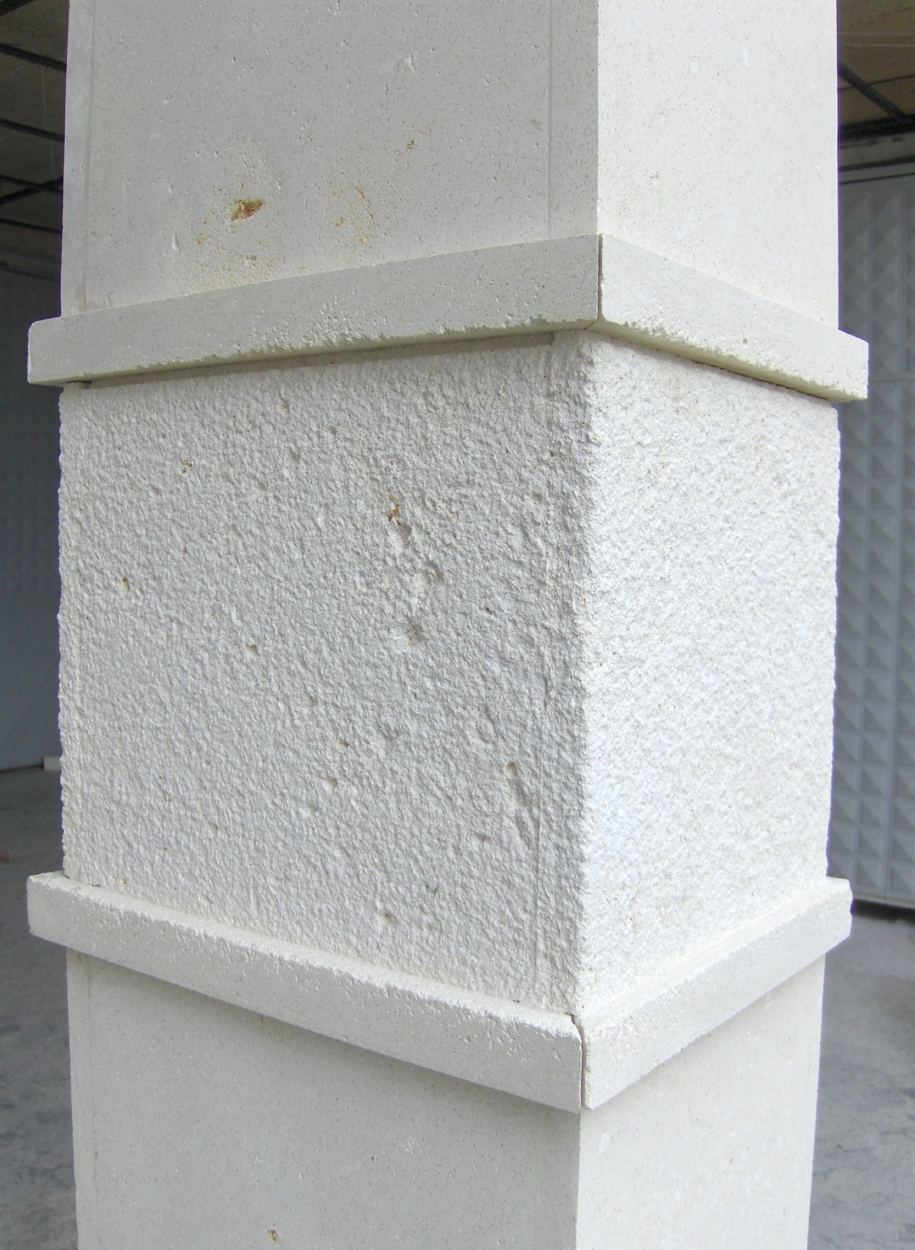 white limestone split face wall cladding